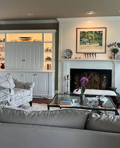 Classic entertainment and display cabinet with concealed TV and lighted shelves