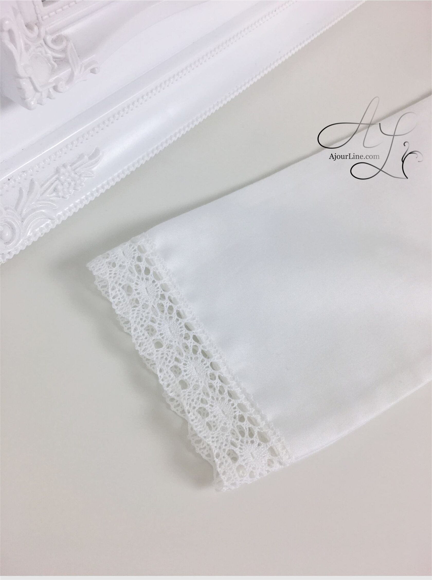 Wrap-style christening shirt for babies up to one year, made from soft natural fabric with embroidery, made to order in Riga, worldwide shipping.