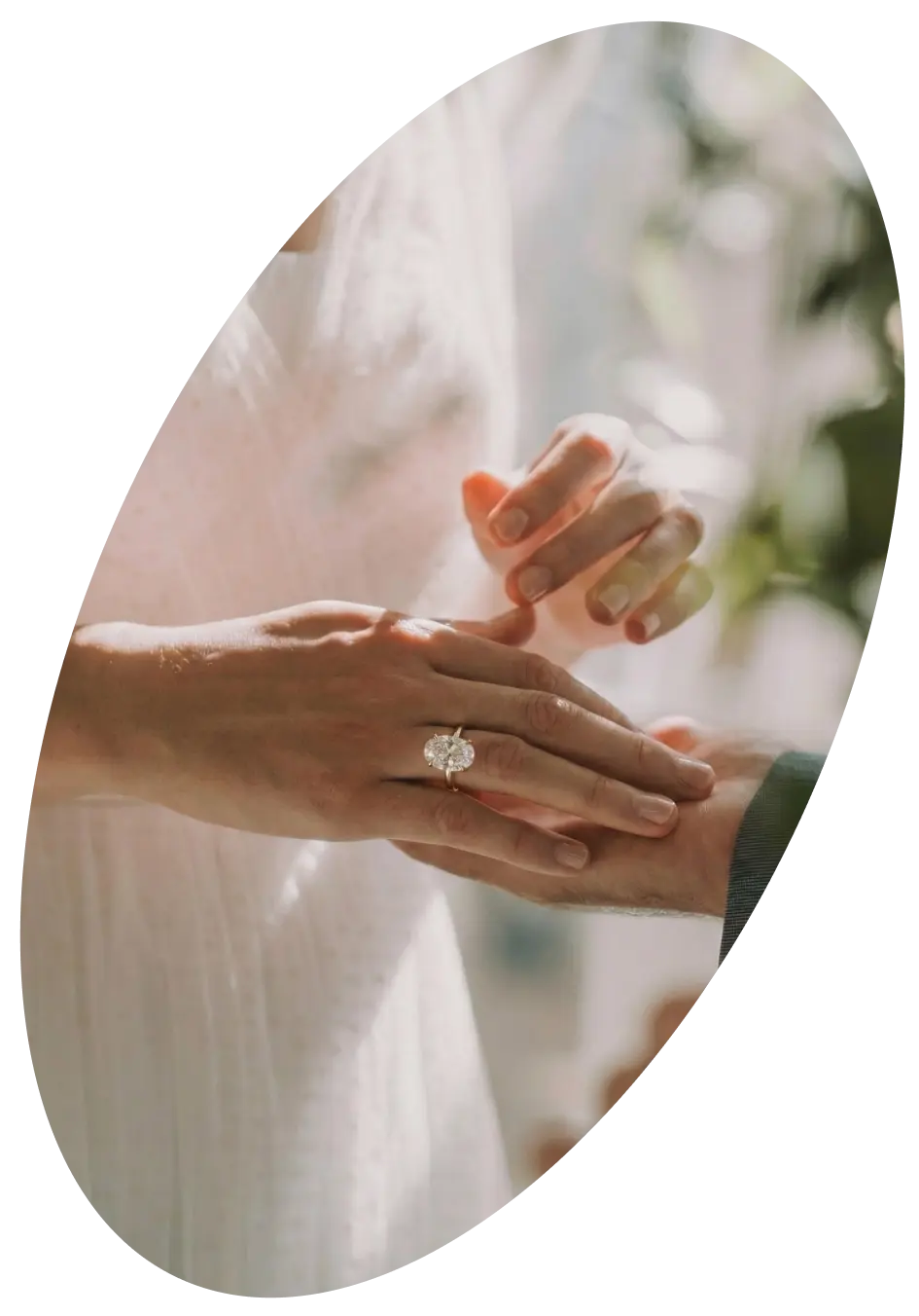 a diamond ring on the girl's finger