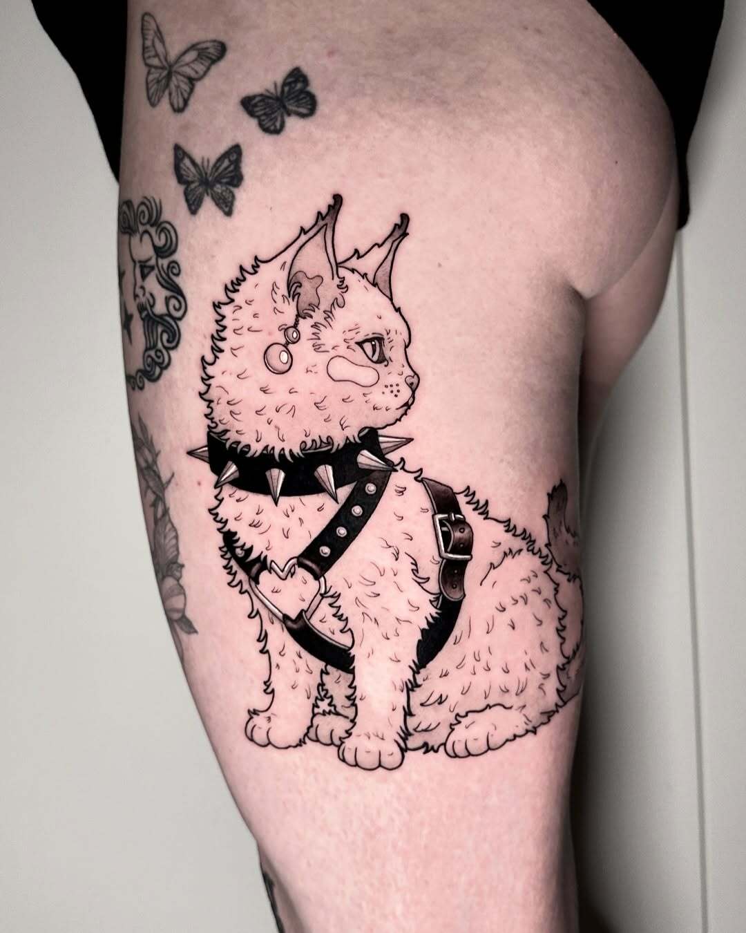 Punk-cat thigh tattoo by Pascal · Beelzeboo.