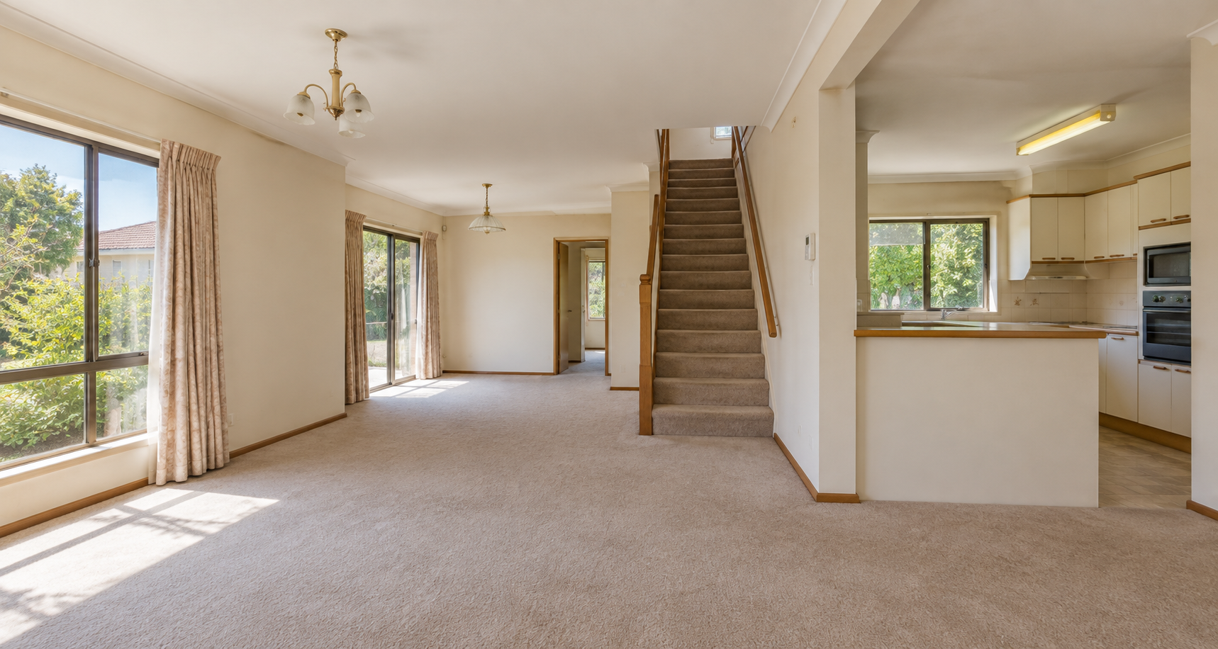 Illustrative before concept of a dated living area; generated placeholder, not an actual St Heliers before photo