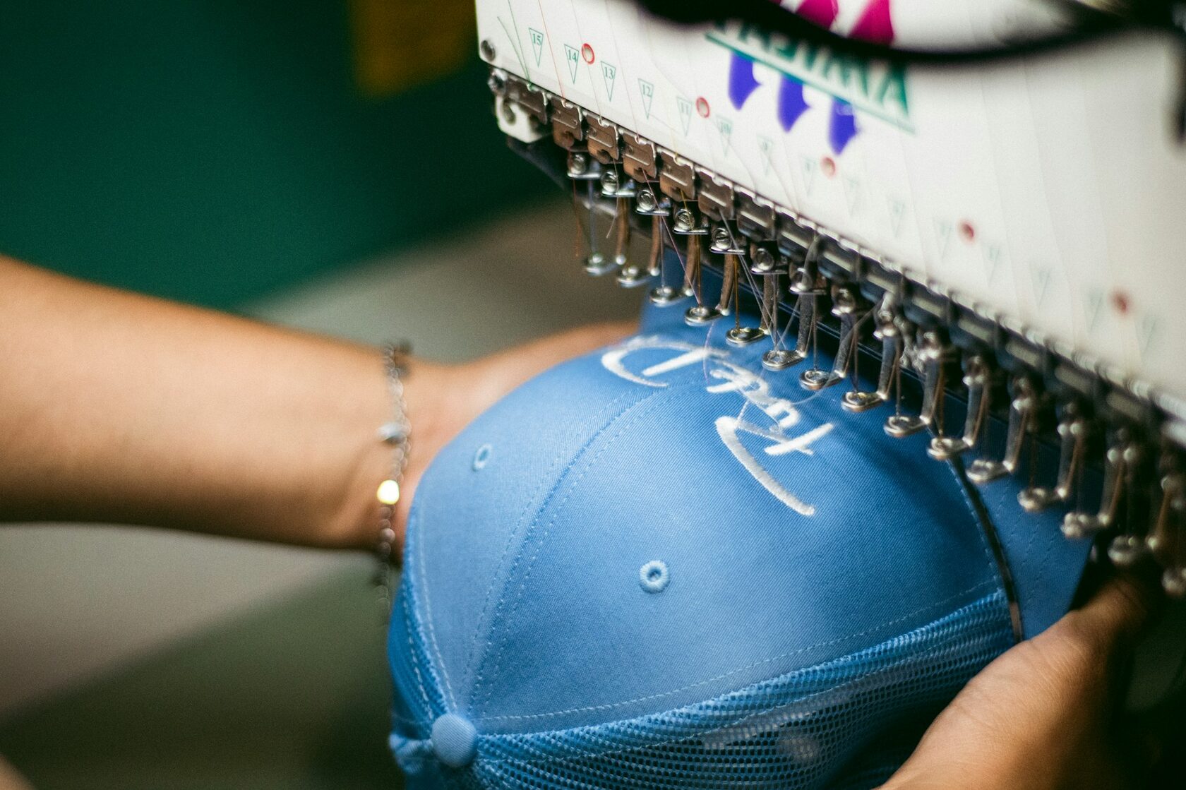 Broderie personnalisée sur vêtement de travail