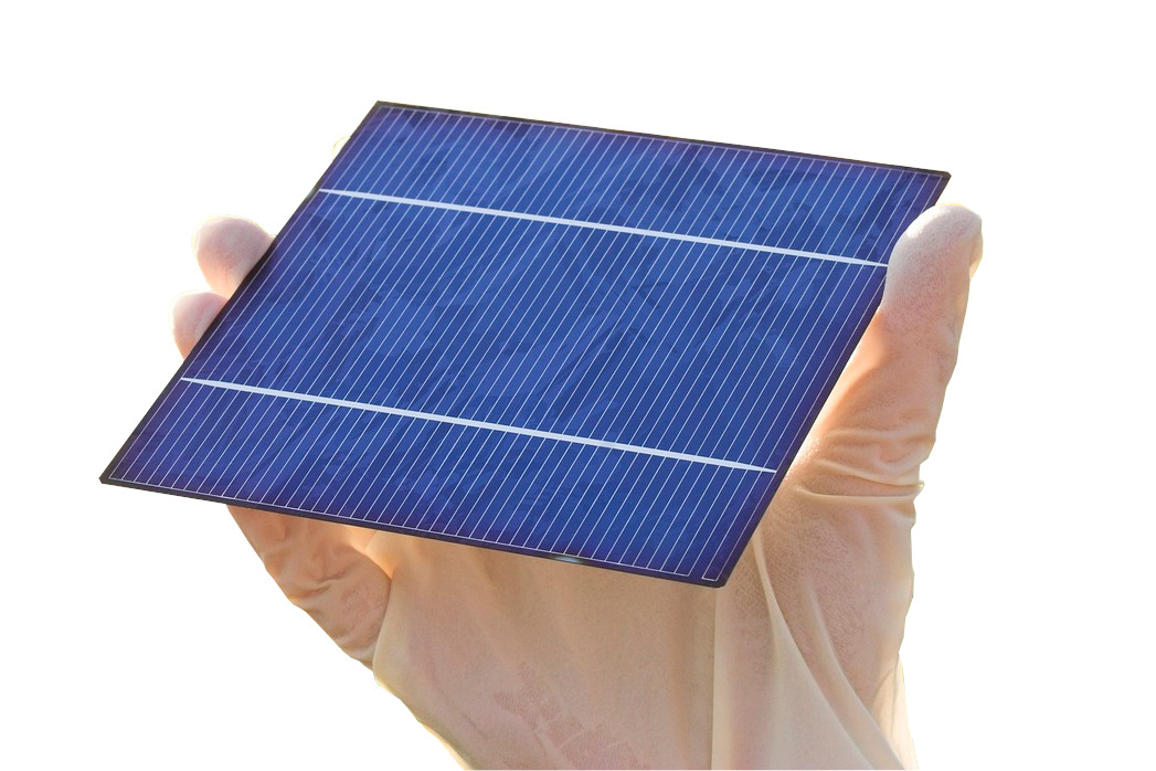 hand holding a conventional solar cell