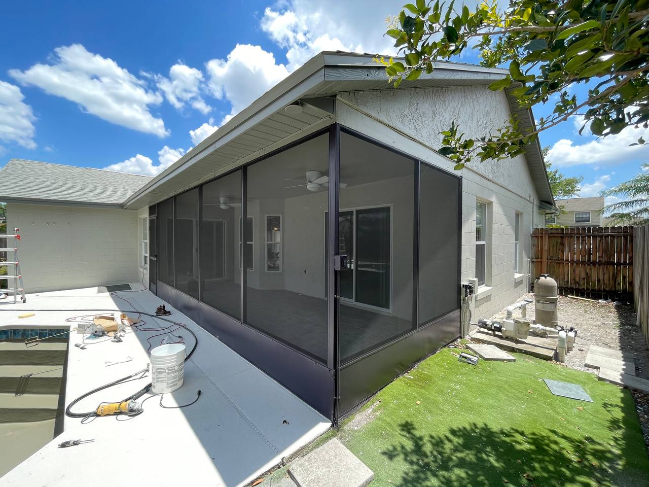 Screened-in patio with comfortable seating