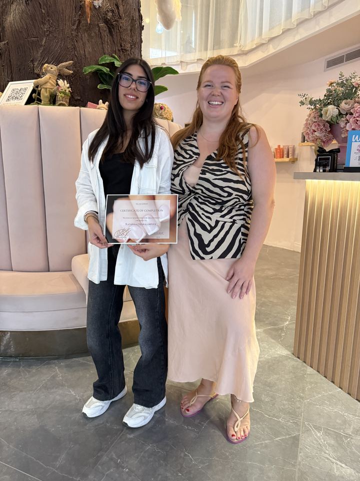 Graduate with her certificate and Nina