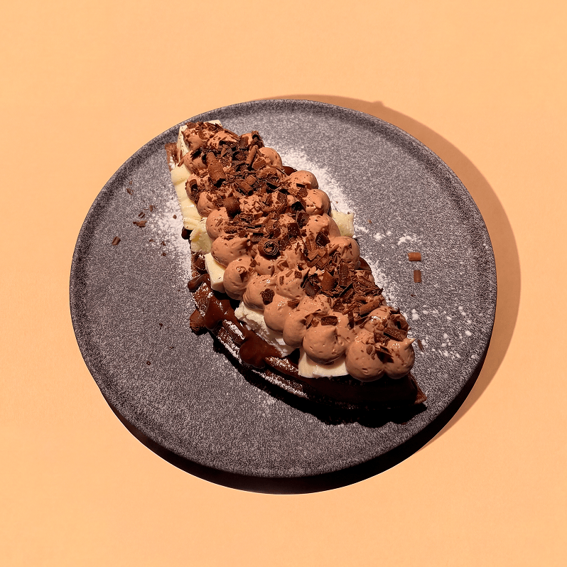 Trio choco waffle with chocolate sauce and chocolate shavings