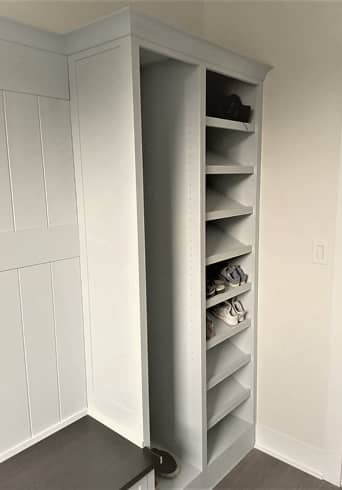 Mudroom shoe cabinet in gray color with built-in bench 