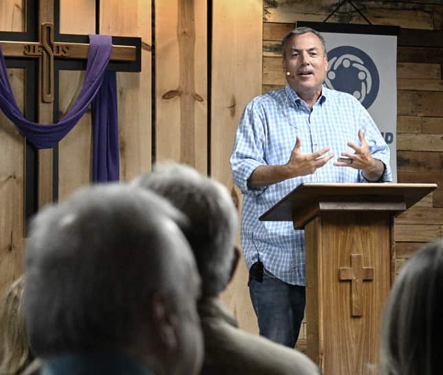 Pastor expounding the scriptures from the pulpit