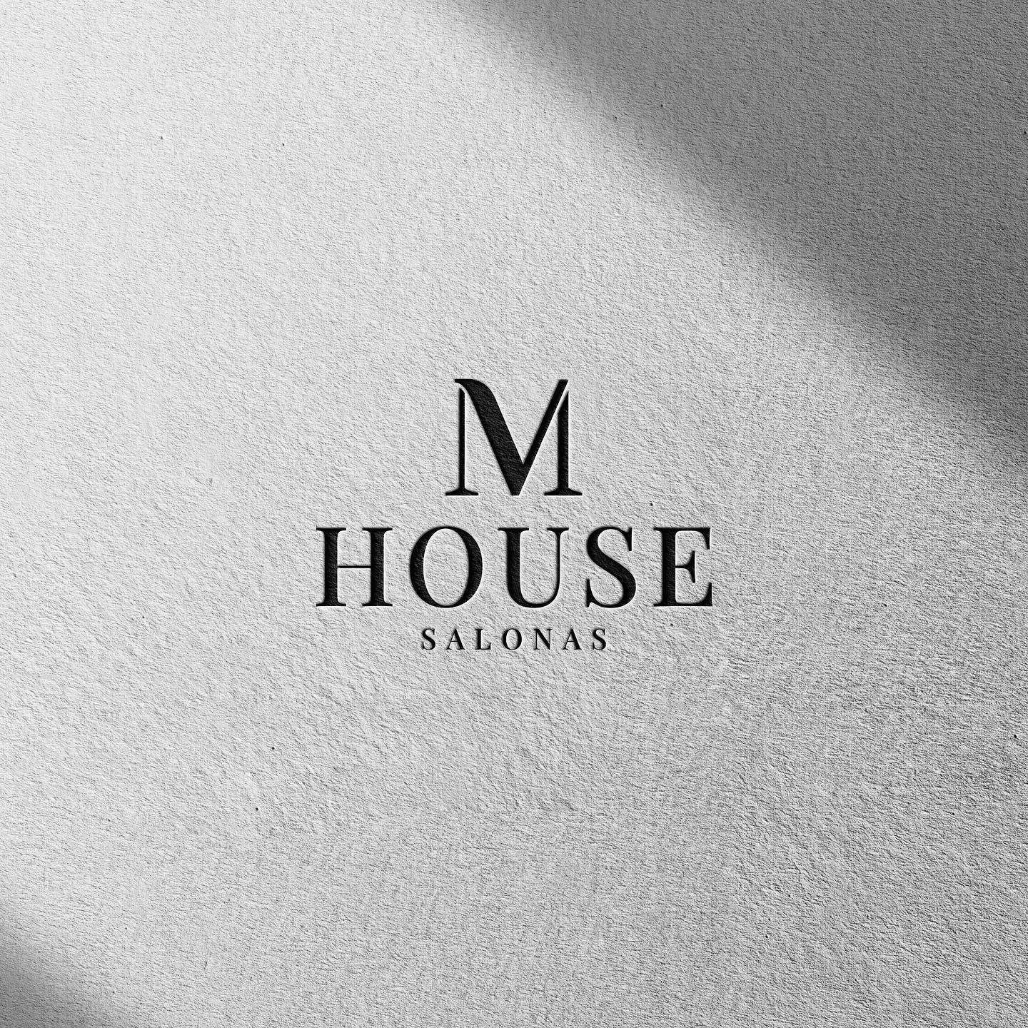 M HOUSE logo on light paper