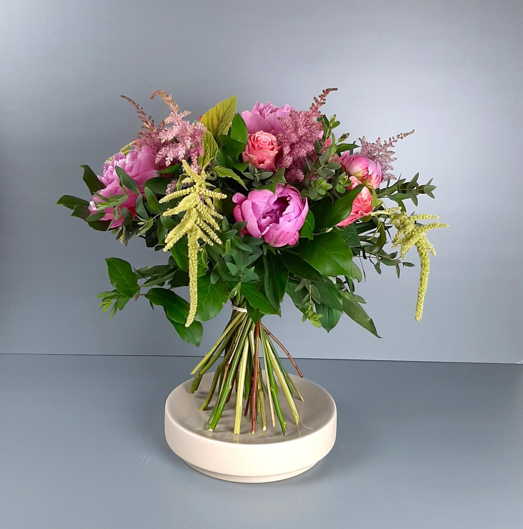 delicate pink bouquet with seasonal flowers