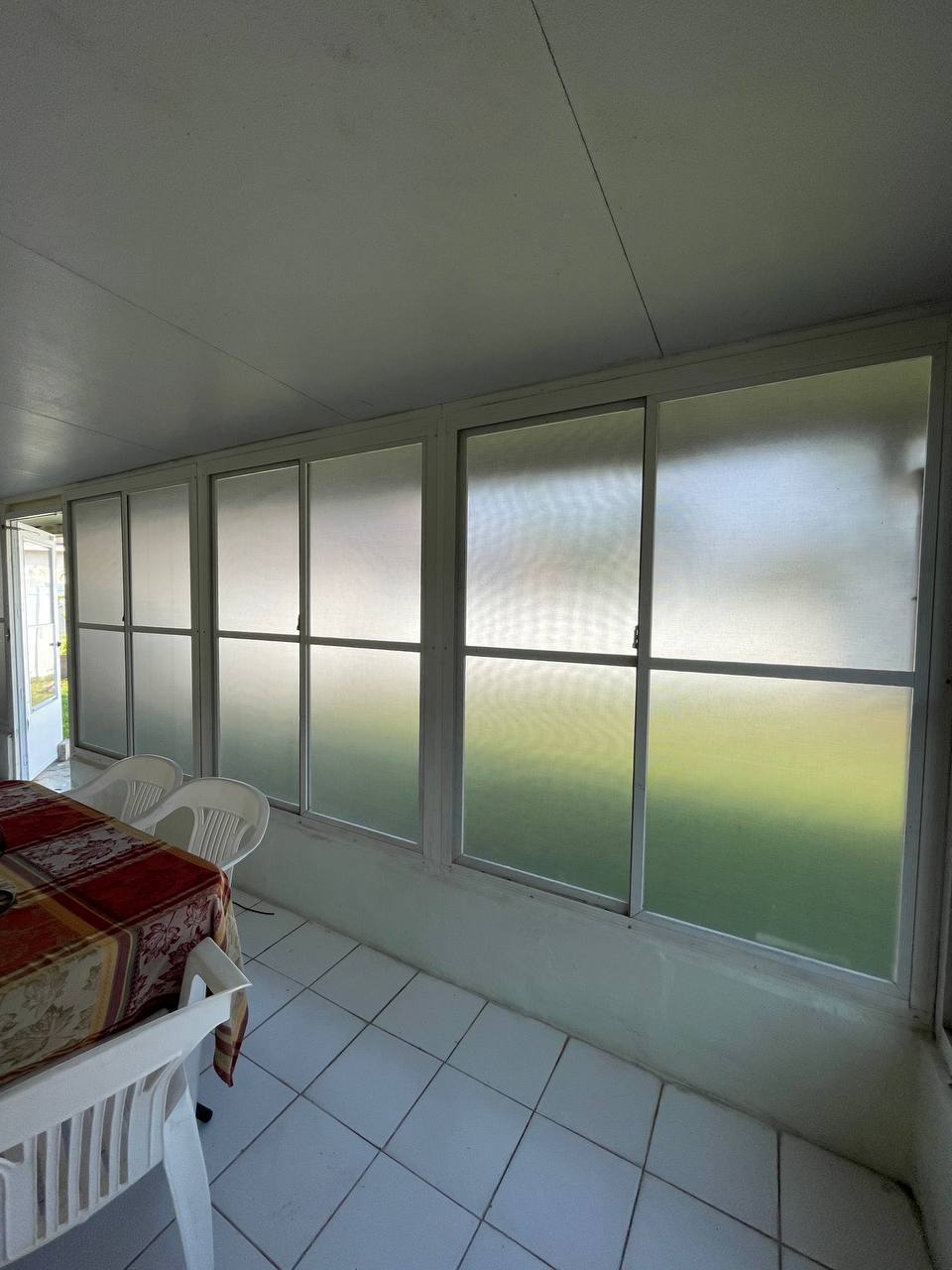 Solar privacy screen filtering sun and glare