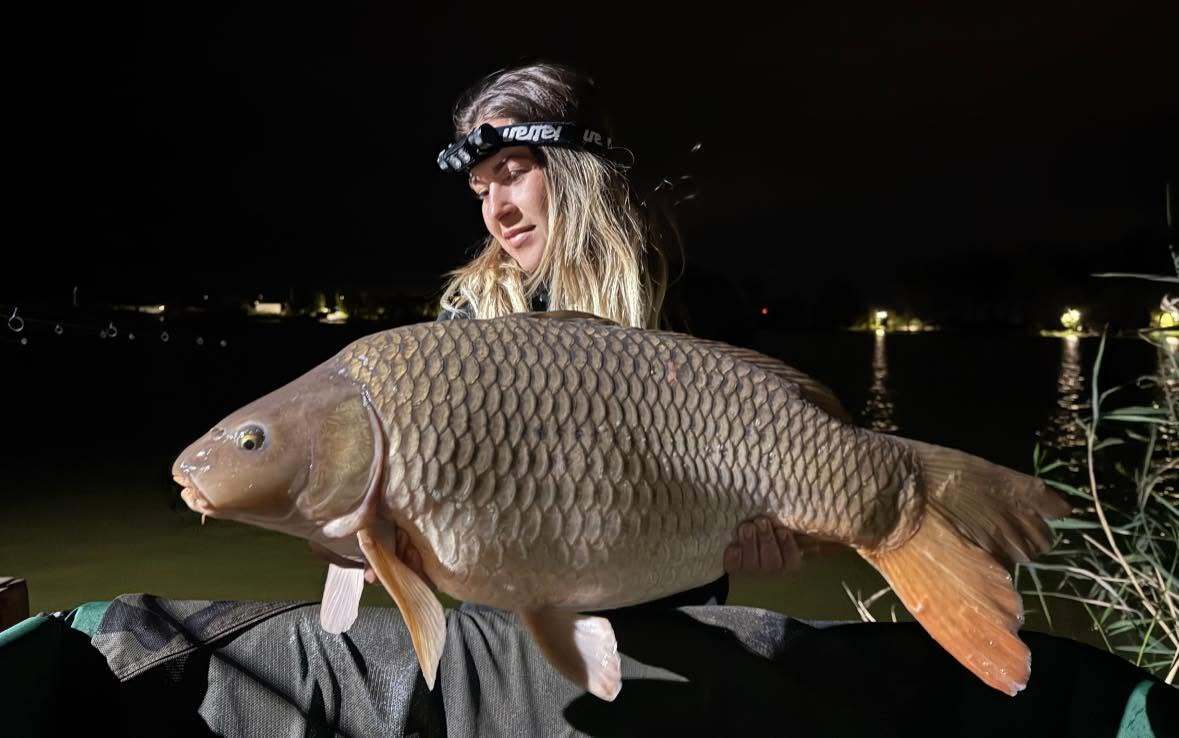 Angler using the Katran W/B 460 PRO headlamp