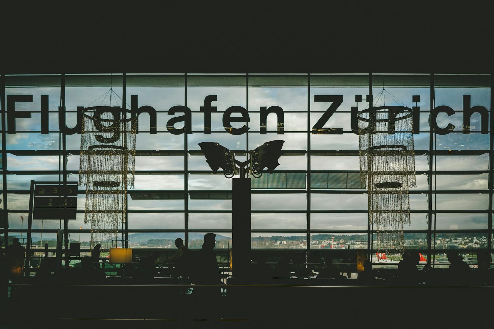 Private driver meeting traveler at Zurich Airport