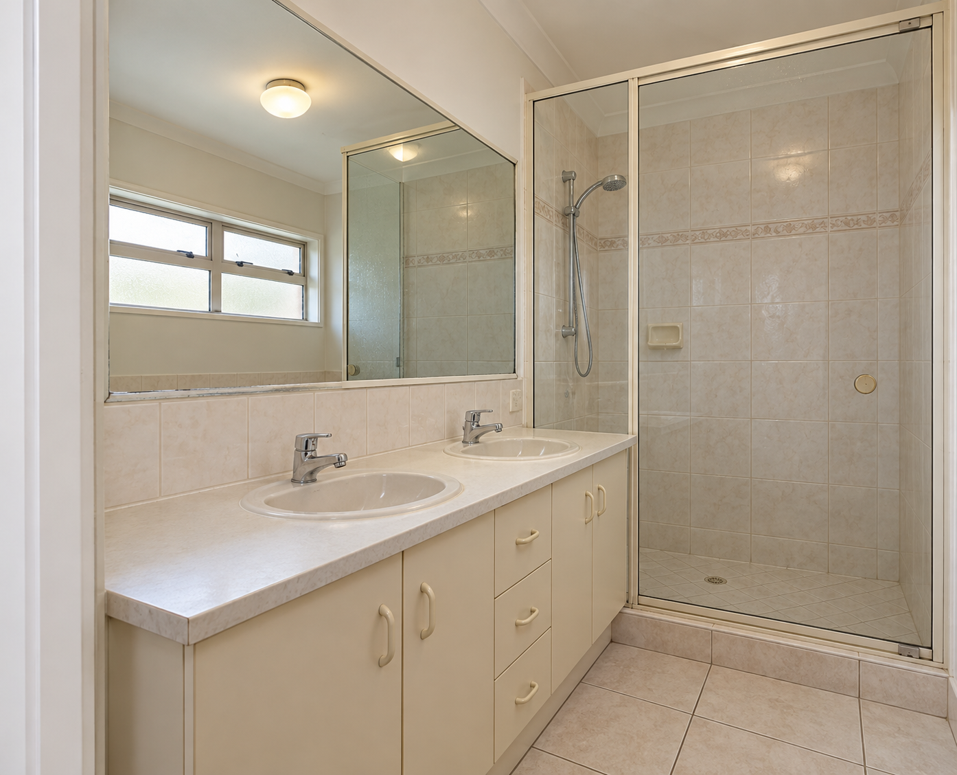 Illustrative before concept for a St Heliers bathroom with double vanity; generated placeholder, not an actual historical photo