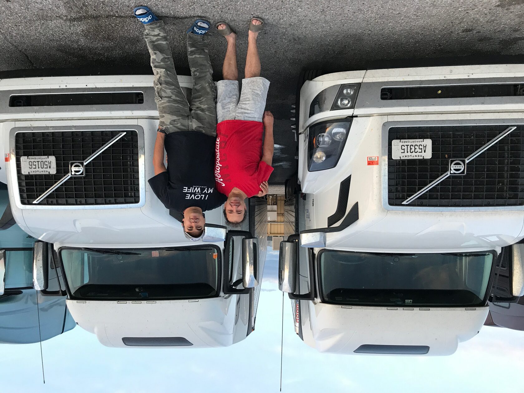 AmericanStar drivers standing with trucks