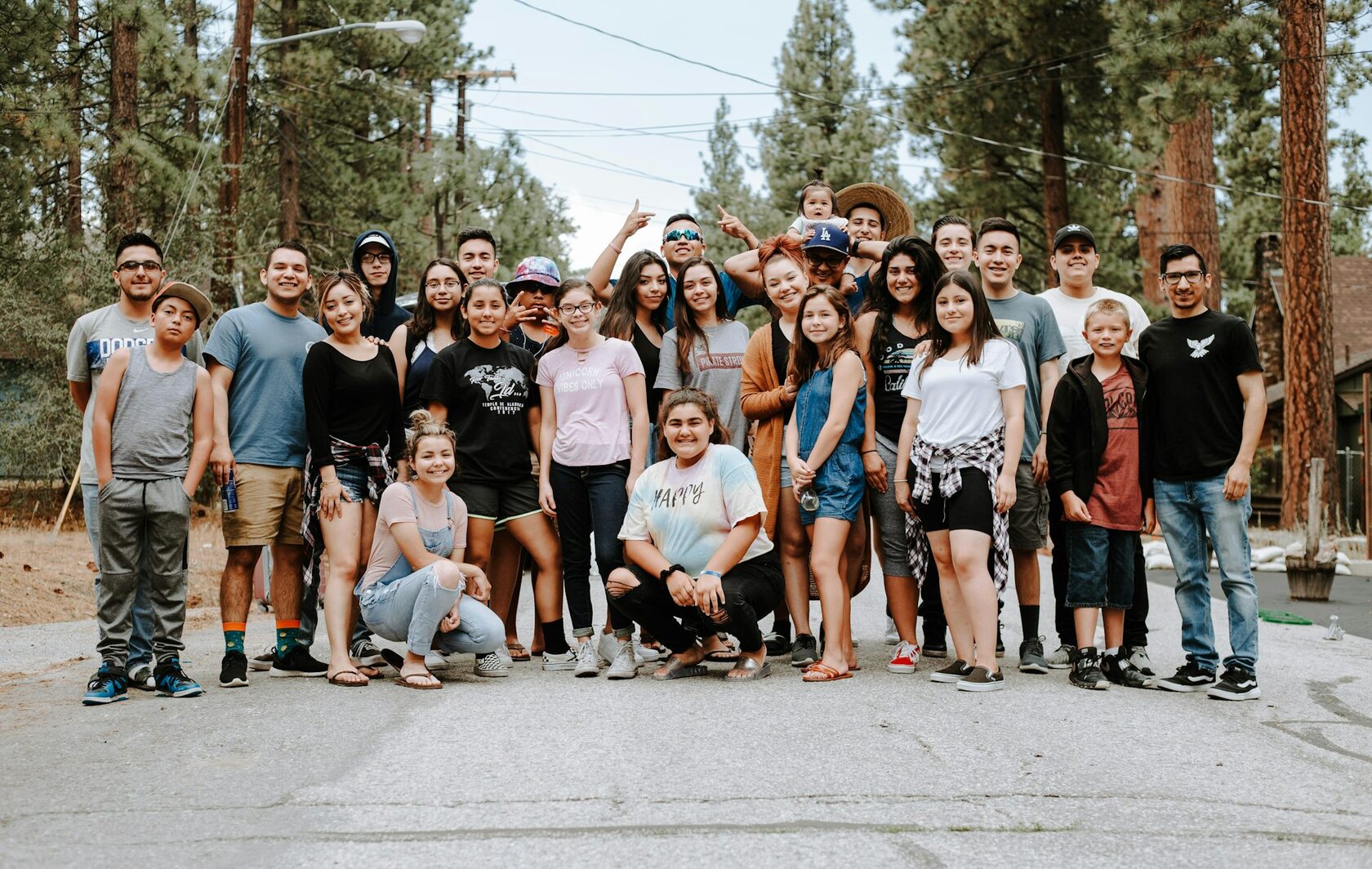 Young people sitting in a circle during a group reflection exercise, listening carefully to one another.