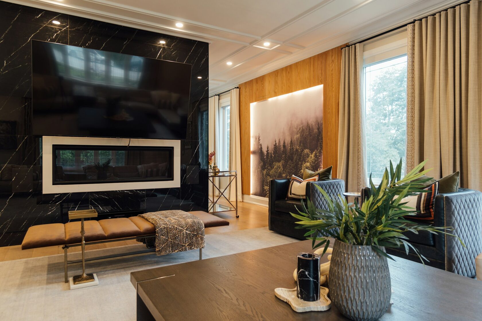Luxury living room with TV integrated into a custom wood slat media wall