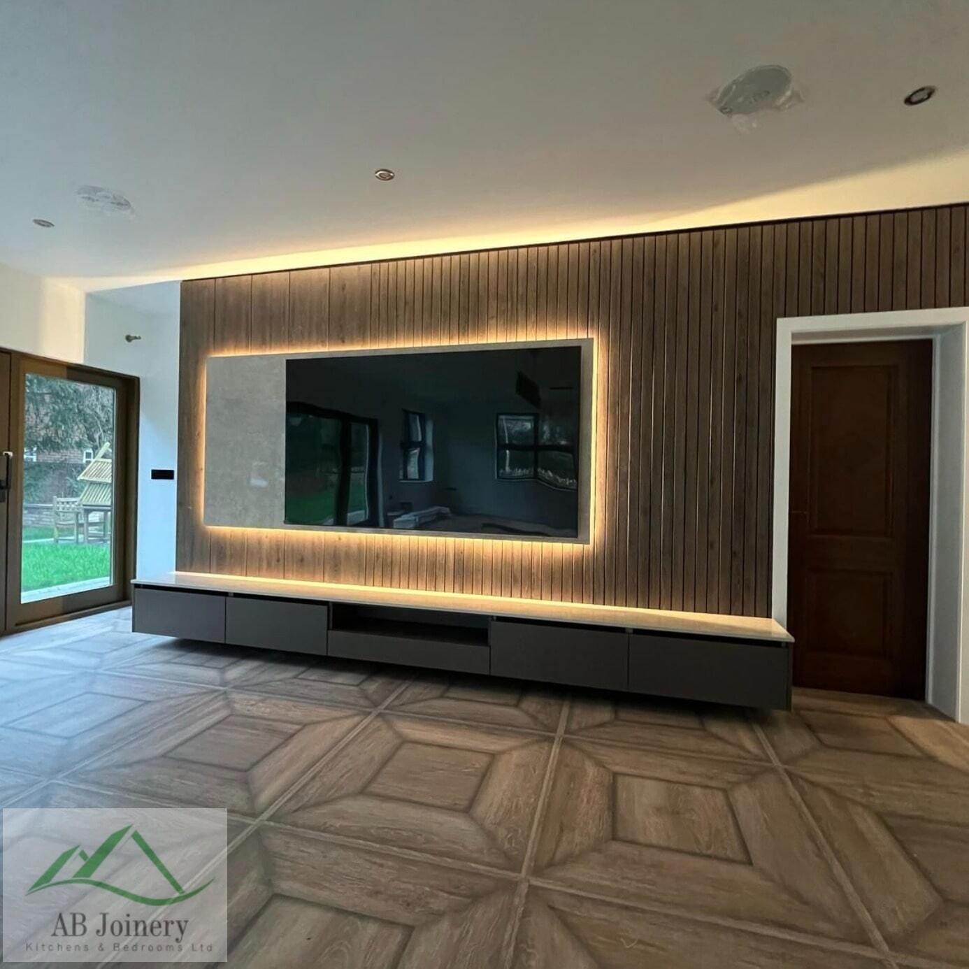 Illuminated display shelving for a bespoke media wall