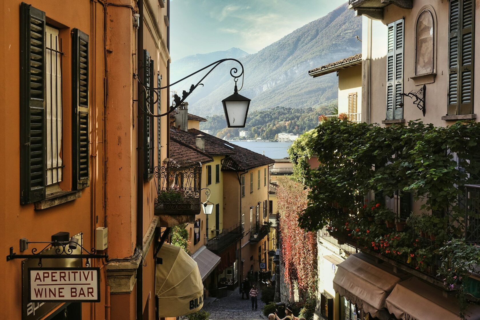 A narrow lane between stone houses in a Lake Como village