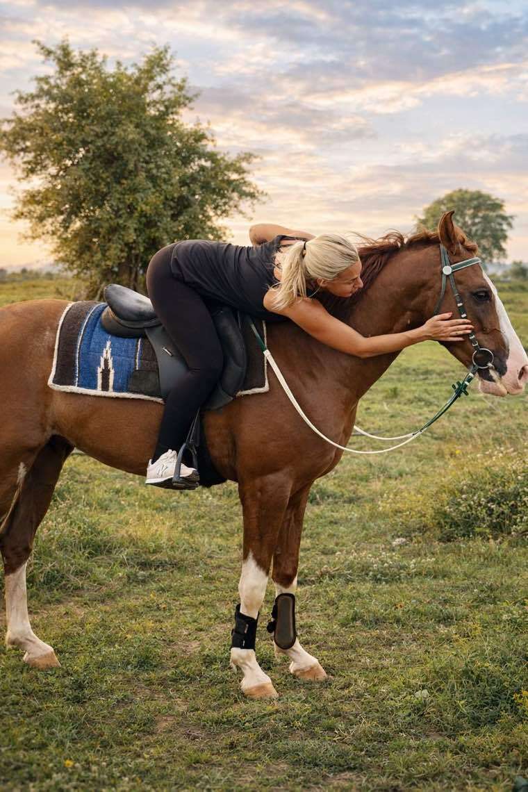 Guest resting affectionately with a horse at Vonfidel Ranch in Sri Lanka