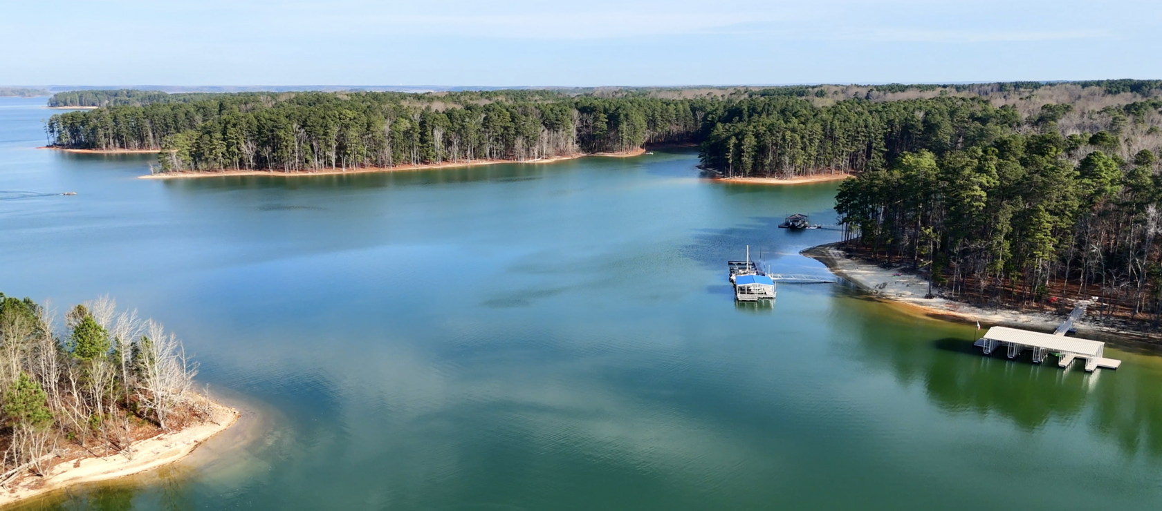 Wooded homesite with mature trees at The Pointe at Kerr Lake