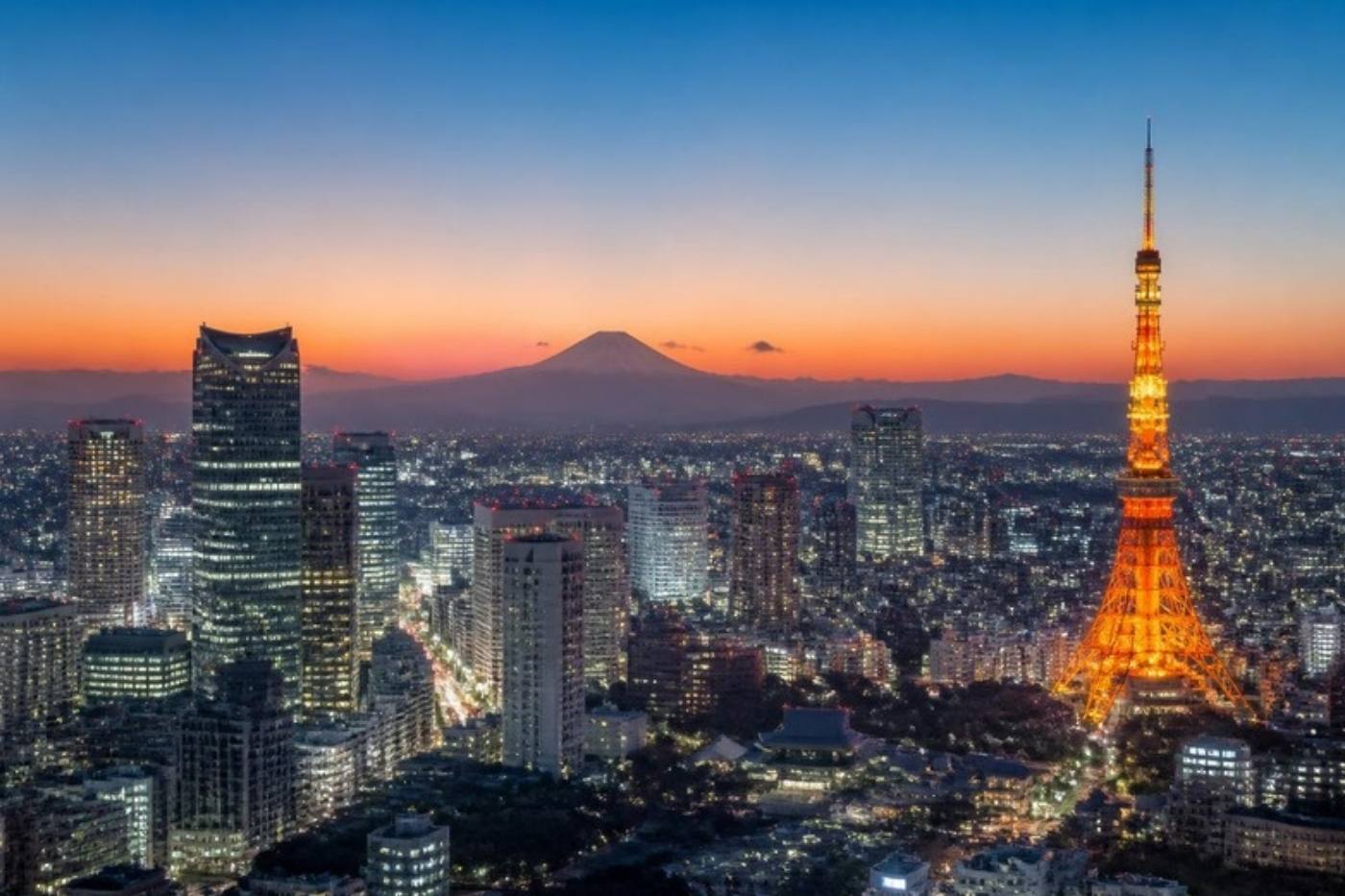 Tokyo skyline at dusk with Tokyo Tower and Mount Fuji