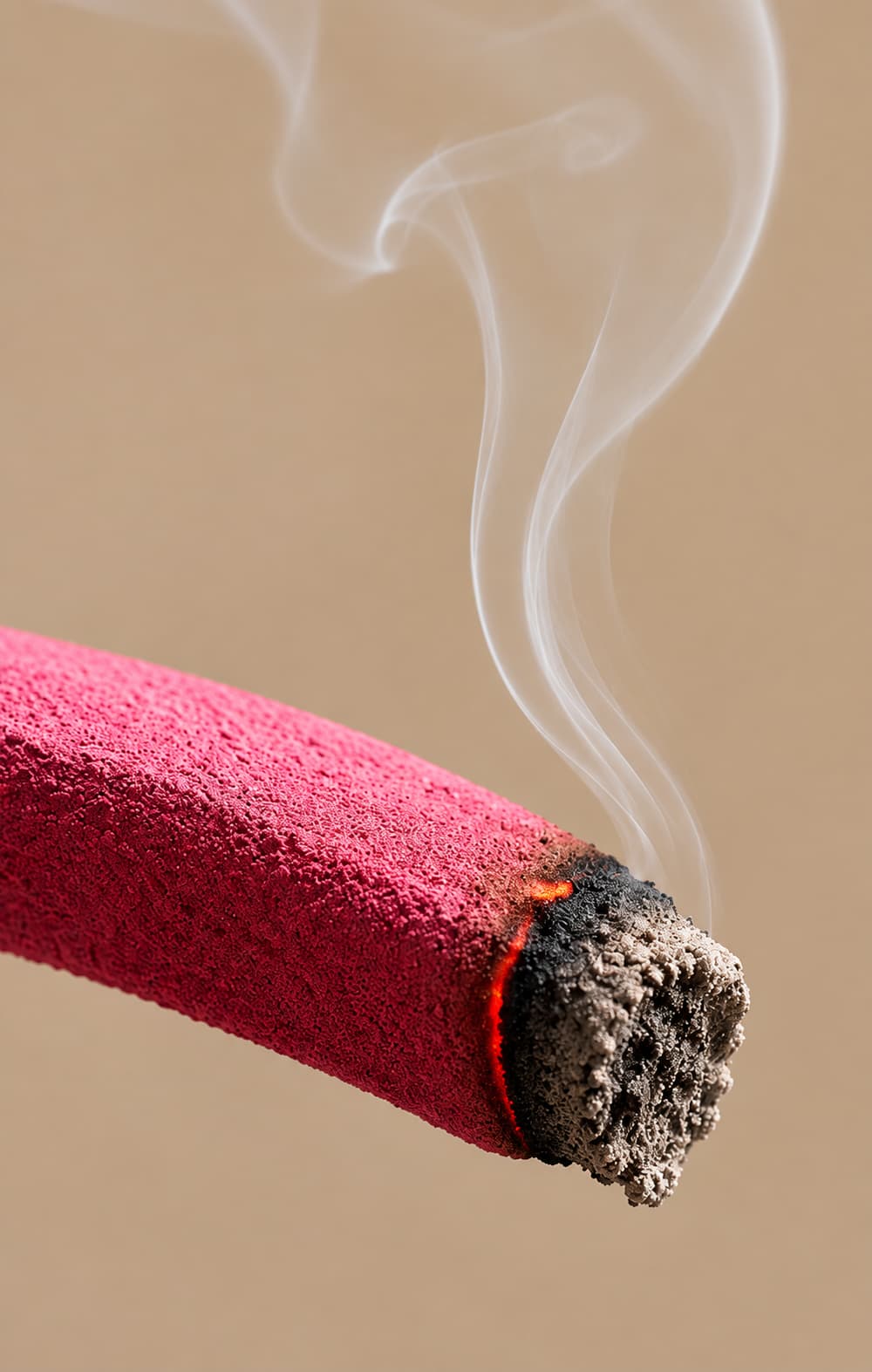 Close-up of a lit mosquito coil