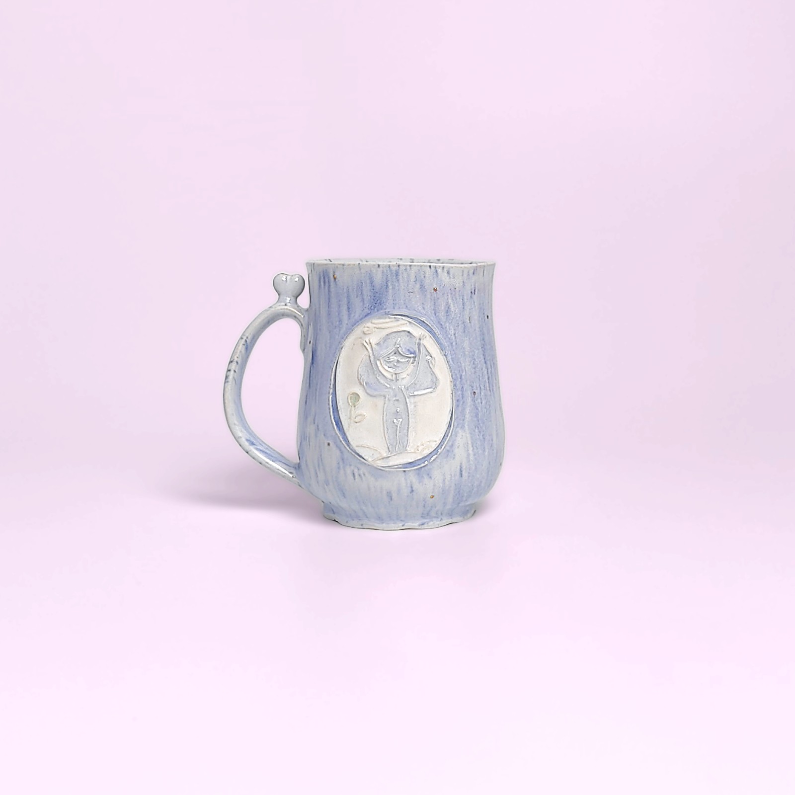whimsical handmade ceramic tea set in soft blue glaze with forest fairy medallions — an elegant, one-of-a-kind creation