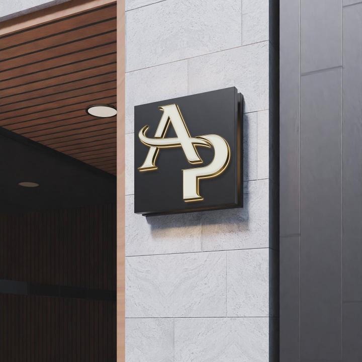 Illuminated AP monogram sign on a facade