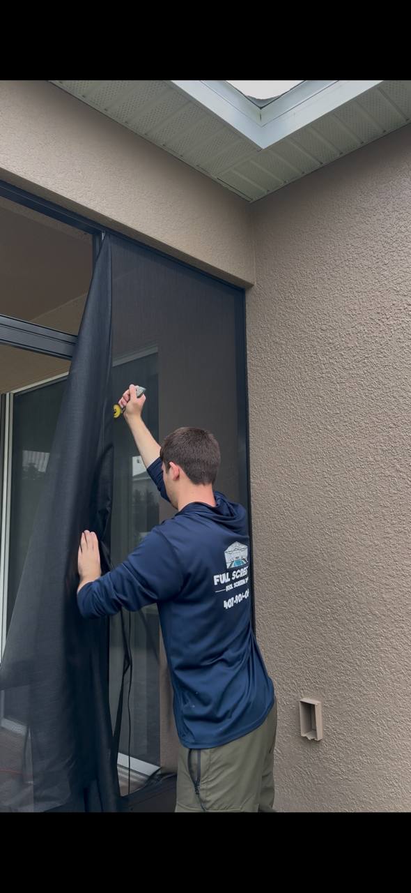 Torn window screen panel being rescreened
