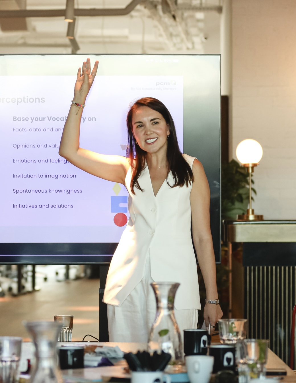 Olga Albers presenting the Process Communication Model on stage