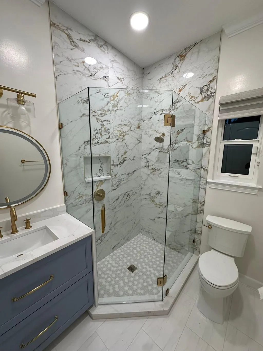 Bathroom remodel with marble-look porcelain shower and frameless glass, Surfside FL