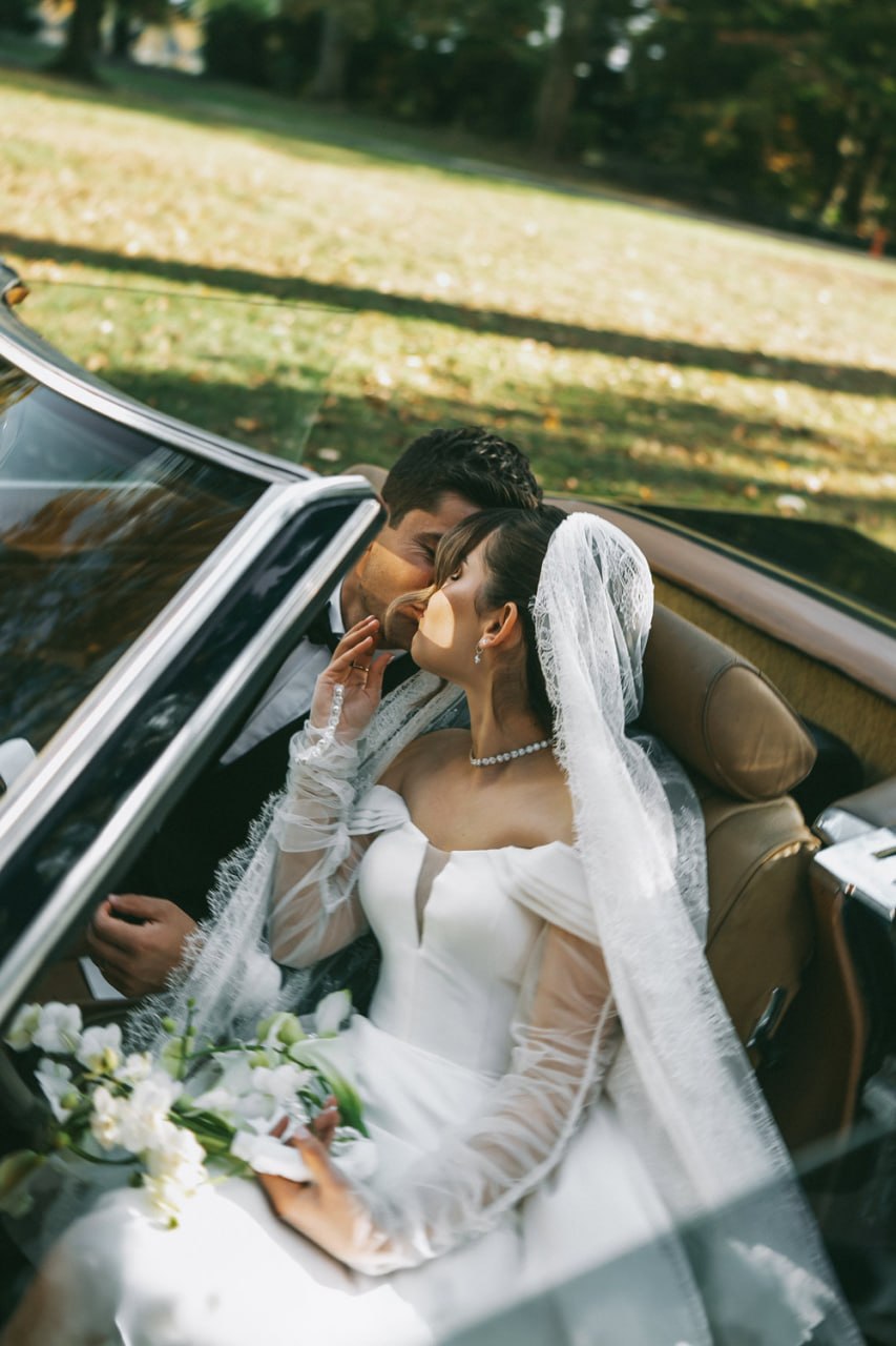 Bride and groom sharing an intimate moment on their wedding day