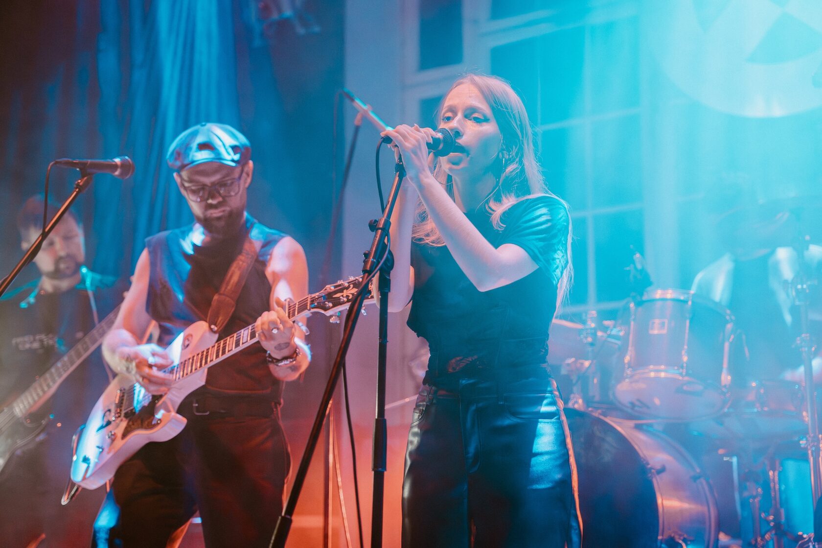 Guitarist and vocalist performing together