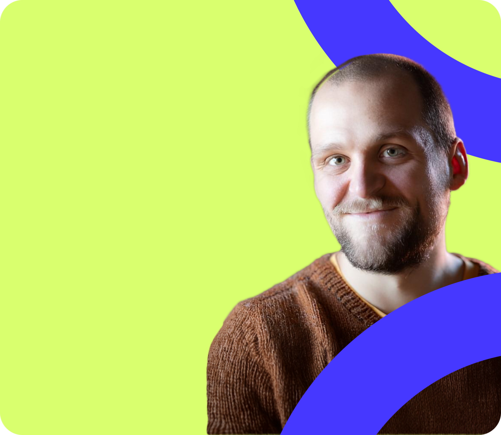 A man wearing a brown sweater smiles warmly (Nicolai Bach Woller).