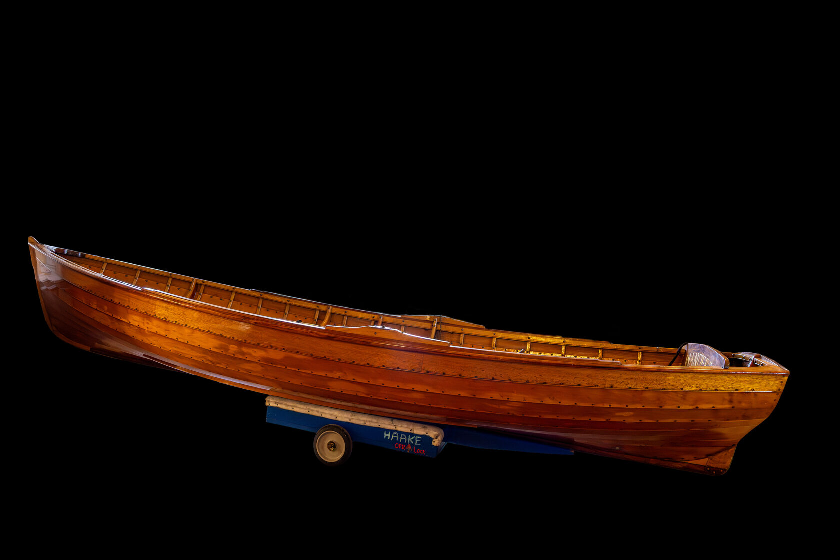 Side view of wooden rowing shell