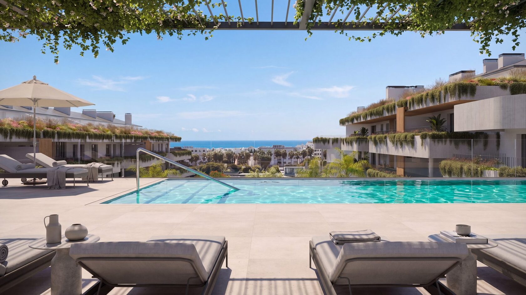 Rooftop pool and sun deck with sea views
