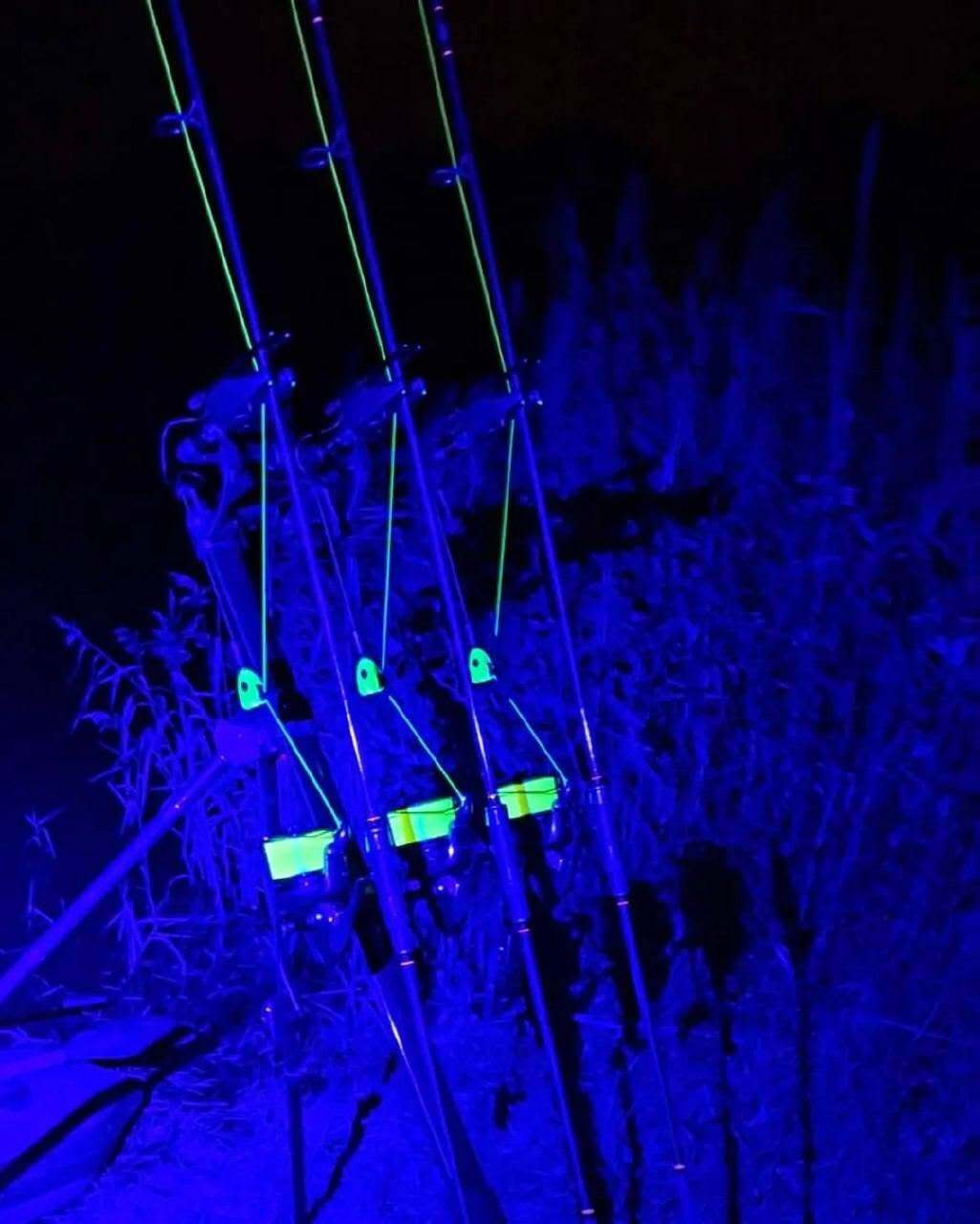 Angler using the Katran W/B 460 PRO headlamp