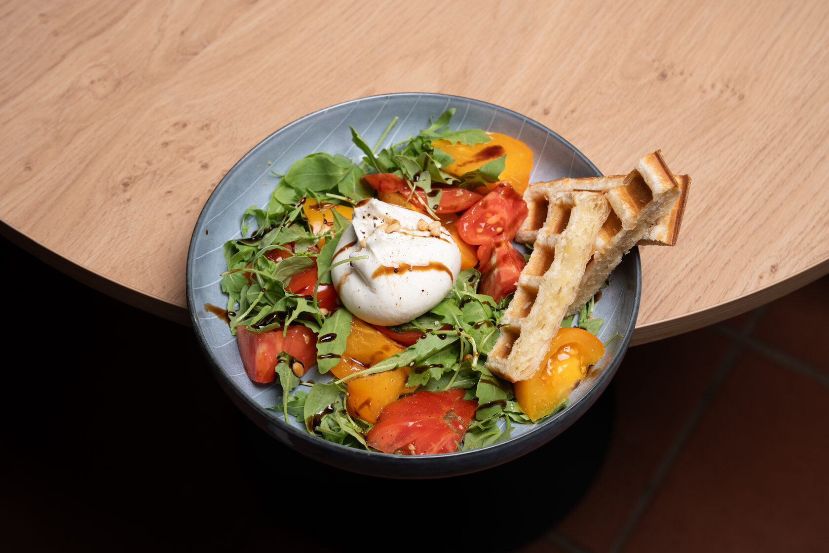 Fresh salad and bread photographed for a restaurant menu