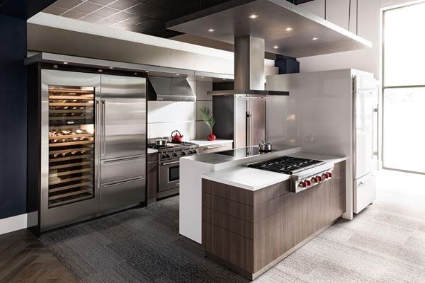 Kitchen with built-in refrigeration and cabinetry