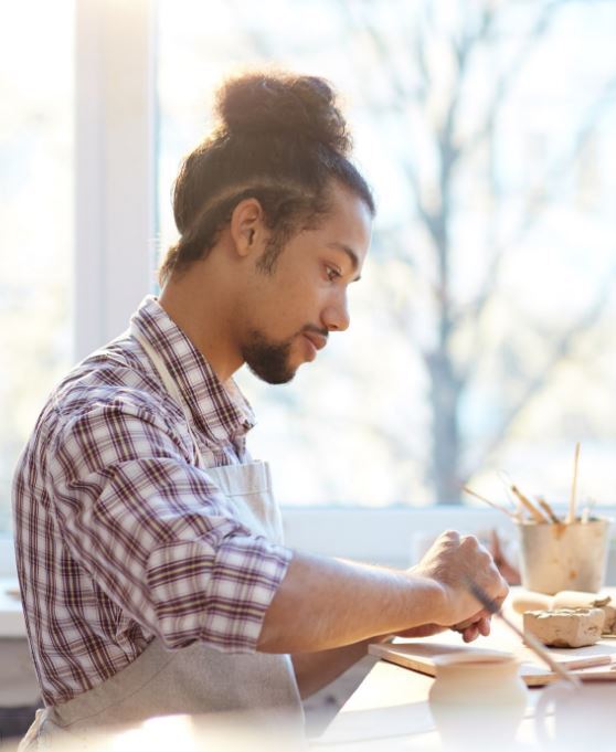 Creating pottery by hand