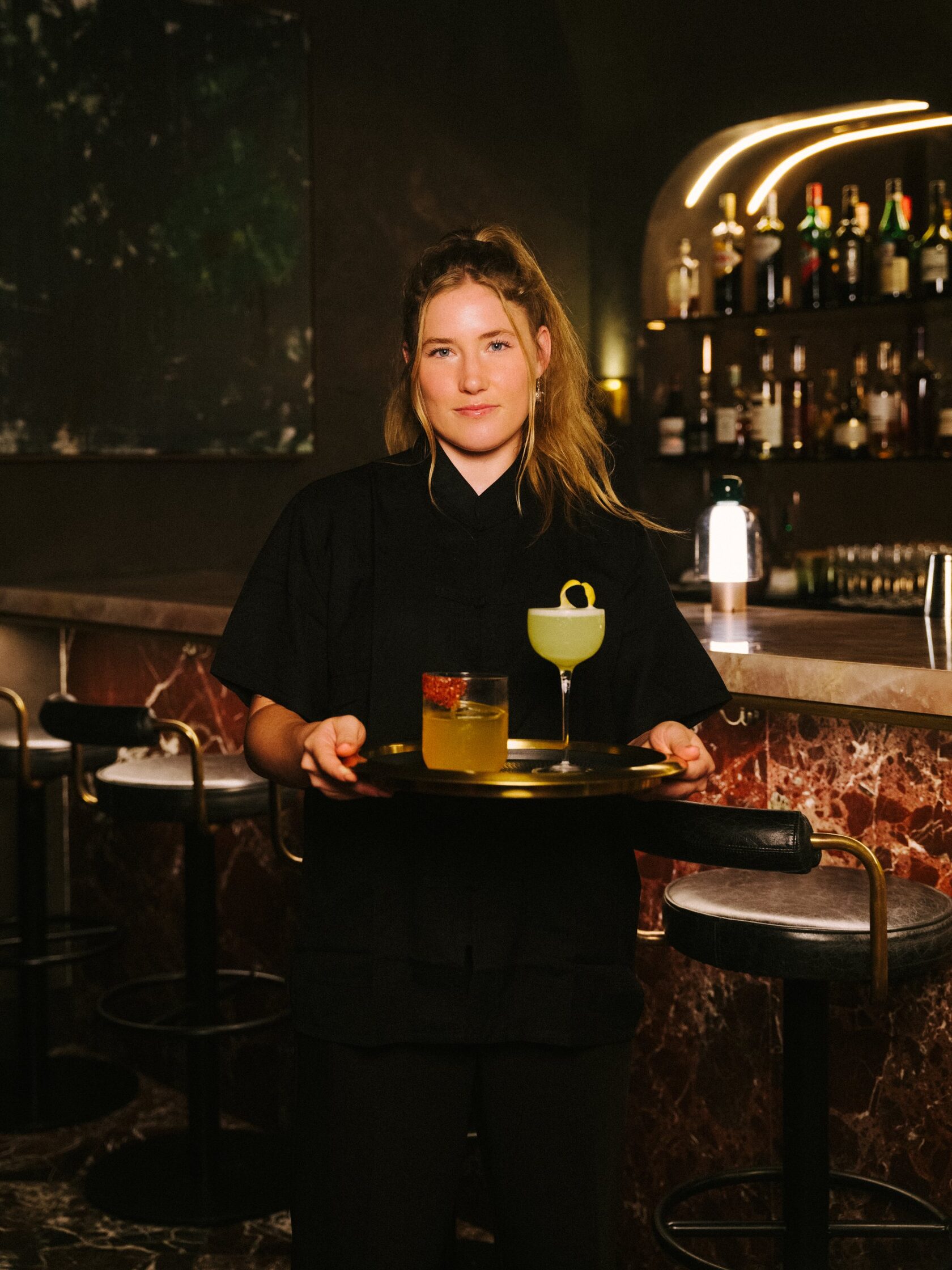 Tiger Tiger bar, server with cocktails
