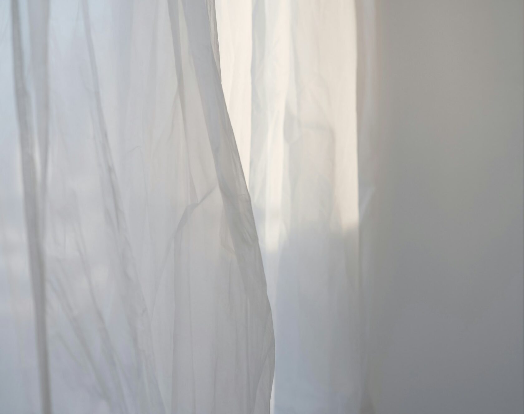 Soft light through sheer curtains