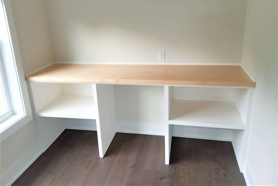 Built-in laundry table with maple counter top