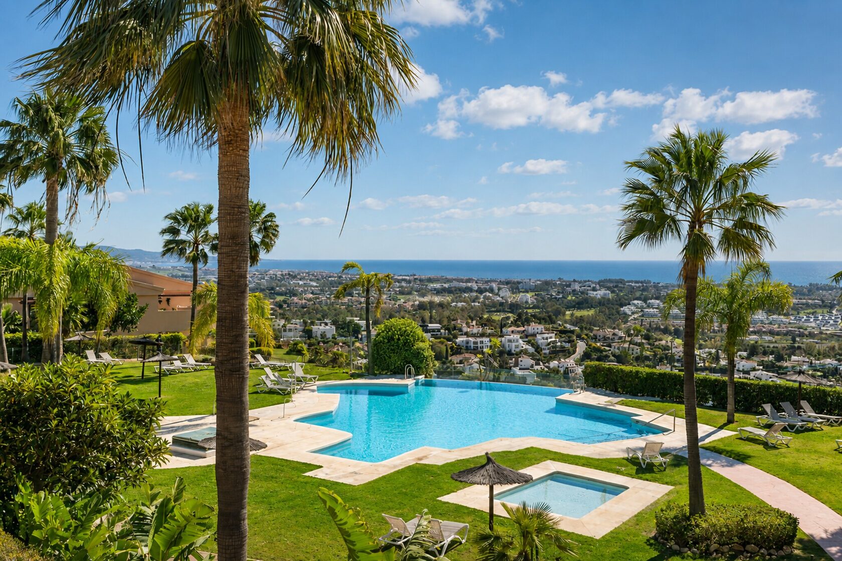 The communal pool with the coast beyond