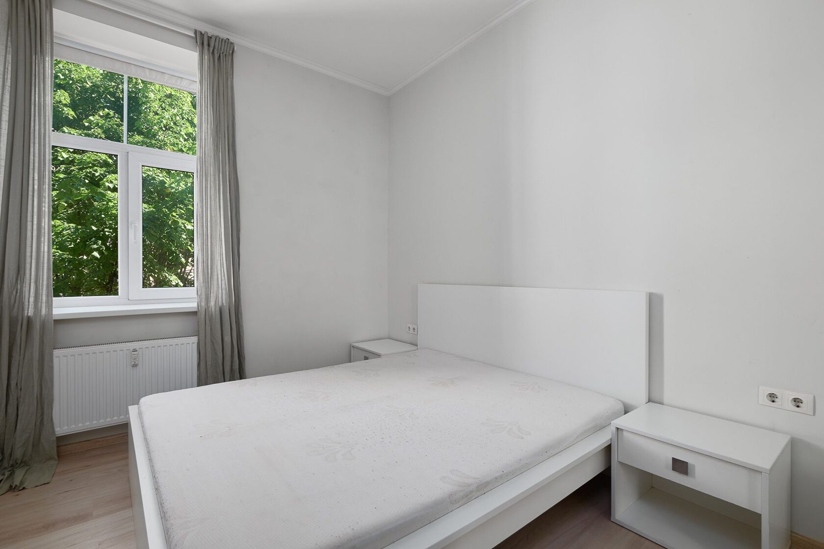 Bedroom with wardrobe wall at Lāčplēša iela 53, Riga