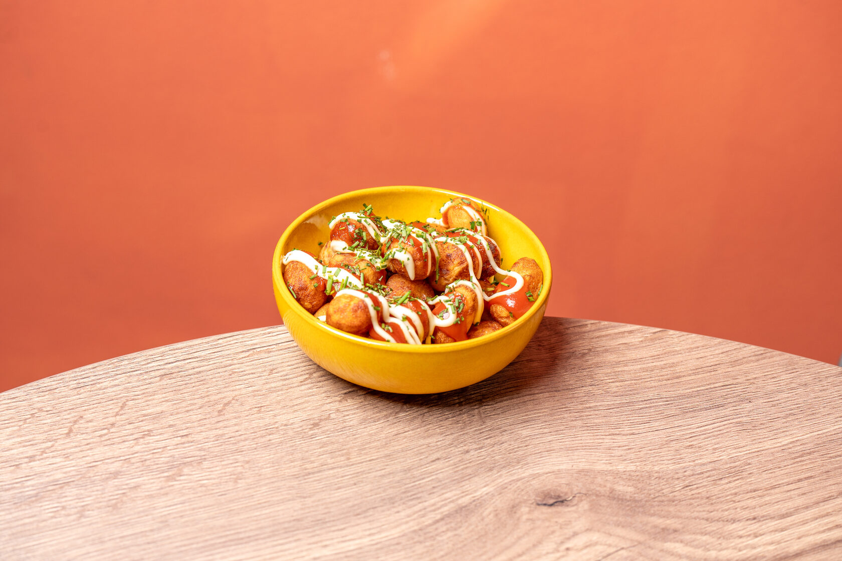 Colourful food photograph with an orange background