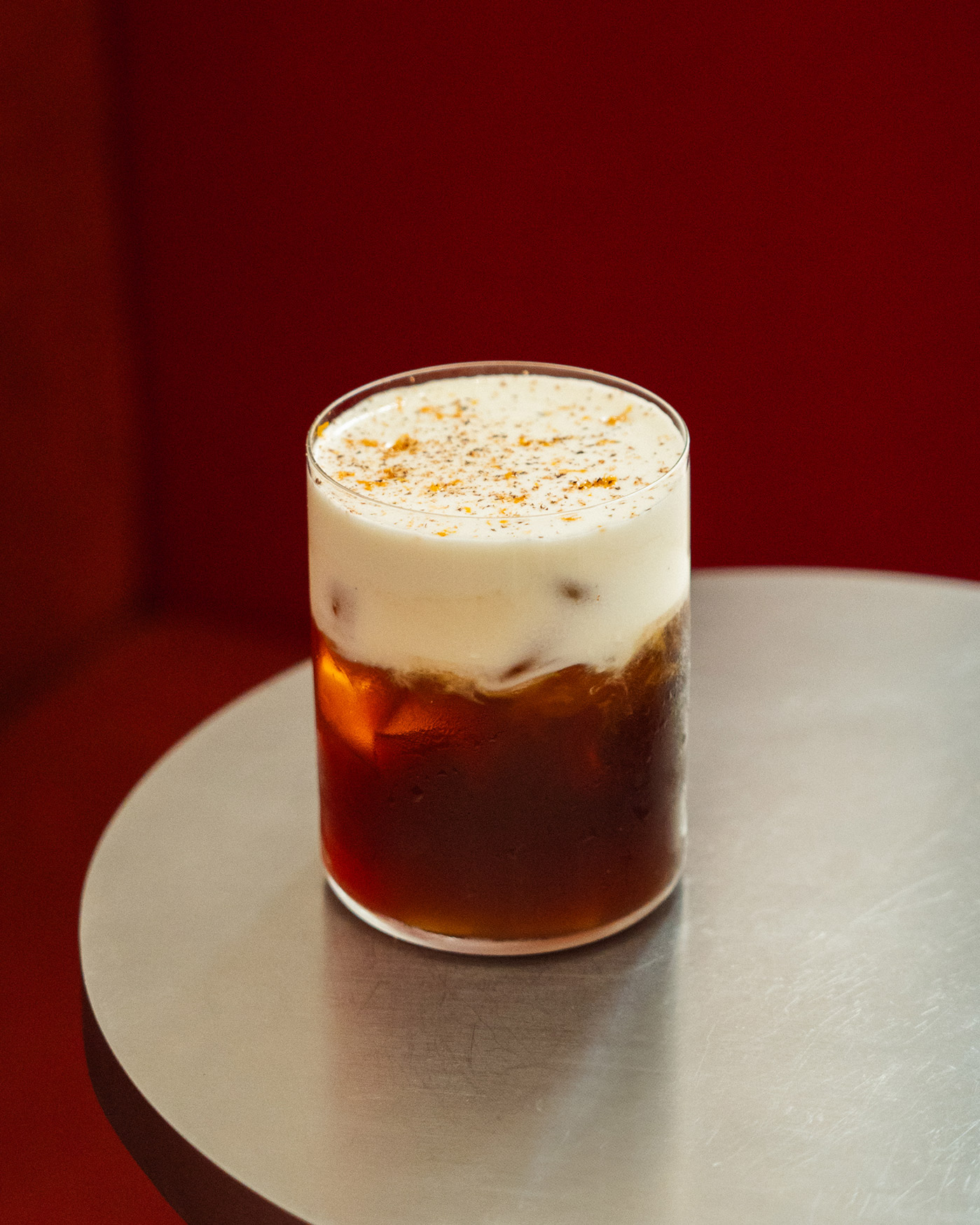 Coffee expert crafting a signature drink