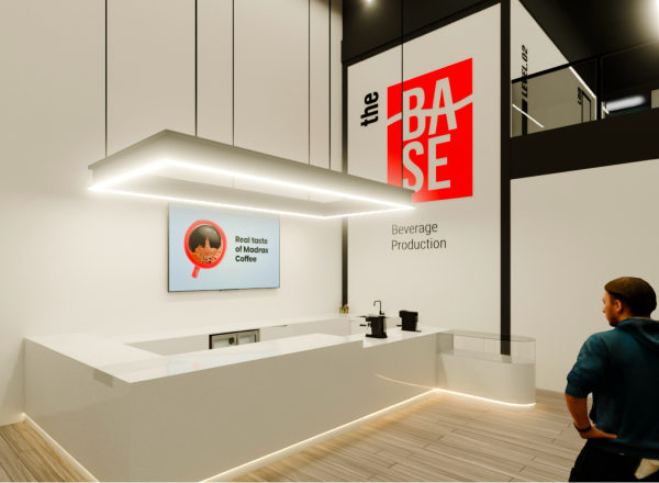 The Base Beverage product showroom with an illuminated brand sign and a display of packaged premixes