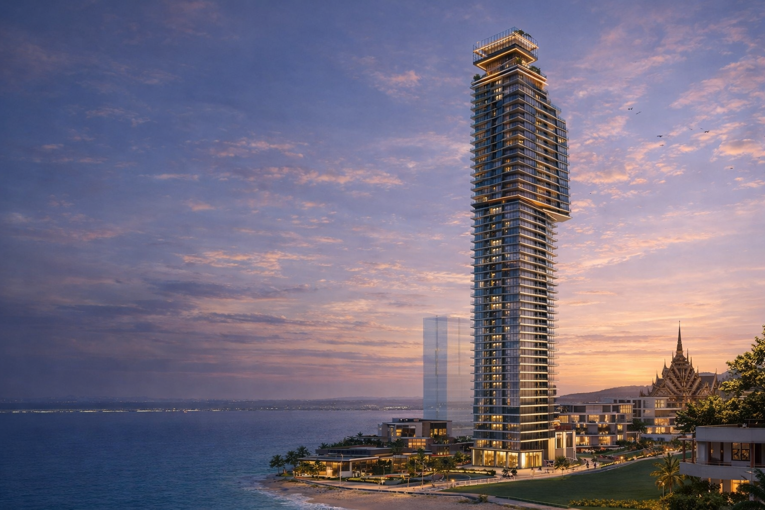 Soondri Wongamat 53-storey beachfront tower on Wongamat Beach, Pattaya, at dusk